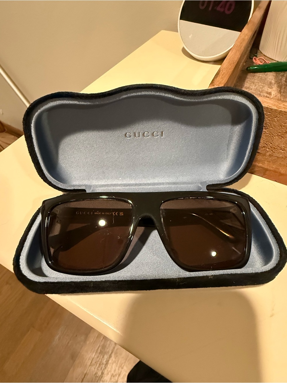 Gucci Black Sunglasses with Gold Logo Accent
